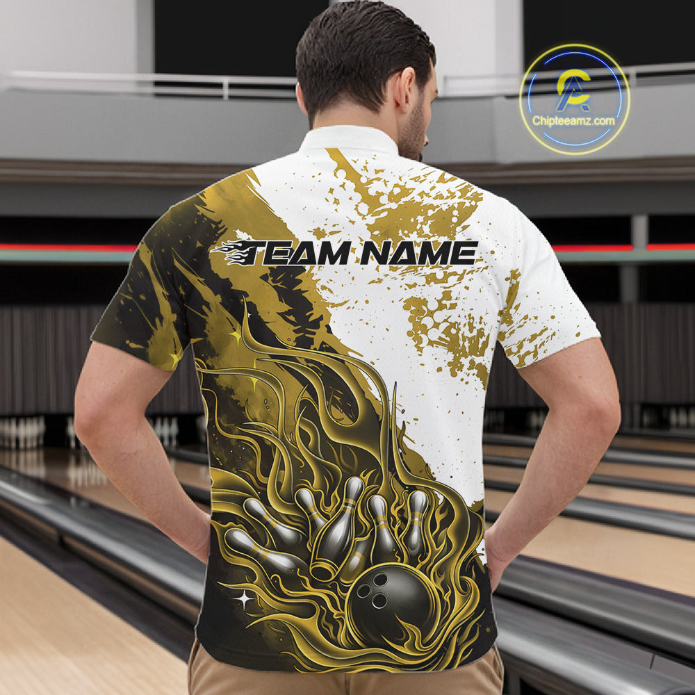 Front view of a male model in a bowling lane wearing a black quarter-zip shirt featuring black, yellow and white flame bowling ball and pins design with bold athletic styling.