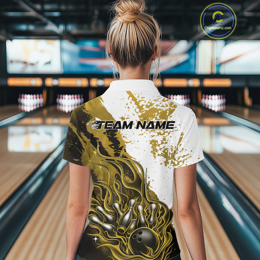 Back view of a female model in a bowling lane wearing a black, yellow and white flame bowling quarter-zip shirt featuring dynamic bowling action graphics.