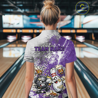 Back view of a female model in a bowling lane wearing a purple and white grunge splatter bowling quarter-zip shirt with a funny cartoon bowling ball and pin fist-fighting illustration.
