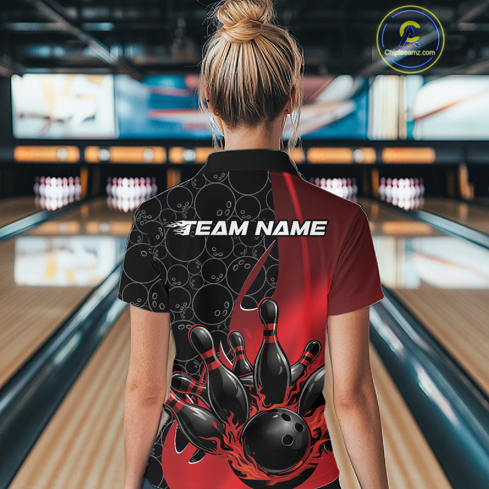 Inside a bowling lane, back view of a female model wearing a black and red bowling quarter-zip shirt, featuring flaming bowling ball hitting pins artwork with gradient pattern design.