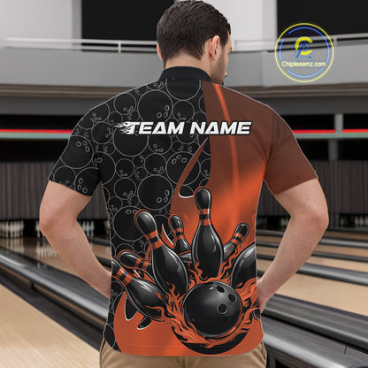 Male model in bowling venue front view wearing black and orange quarter zip shirt featuring dynamic flaming bowling ball and pin impact illustration