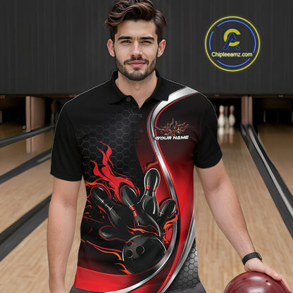 Male model seen from the front in a bowling lane wearing a black and red polo shirt featuring a flame bowling ball striking pins in an energetic action scene.