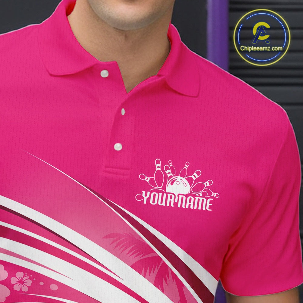 Close-up left chest detail of a pink bowling polo shirt featuring a tropical flamingo in sunglasses beside a bowling ball.