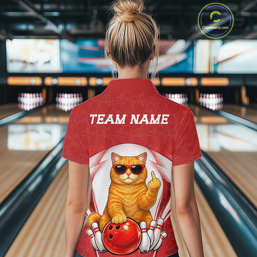 Back view of a female model in a bowling venue wearing a bowling polo shirt featuring a British Shorthair cat in sunglasses beside a bowling ball.