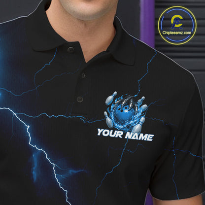 Left chest close-up of a black and blue bowling polo featuring a dragon claw gripping a flaming bowling ball.