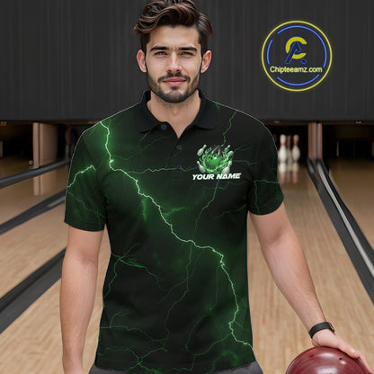 Male model at the bowling lane wearing a black and green bowling polo with fantasy dragon claw artwork and fiery bowling graphics.