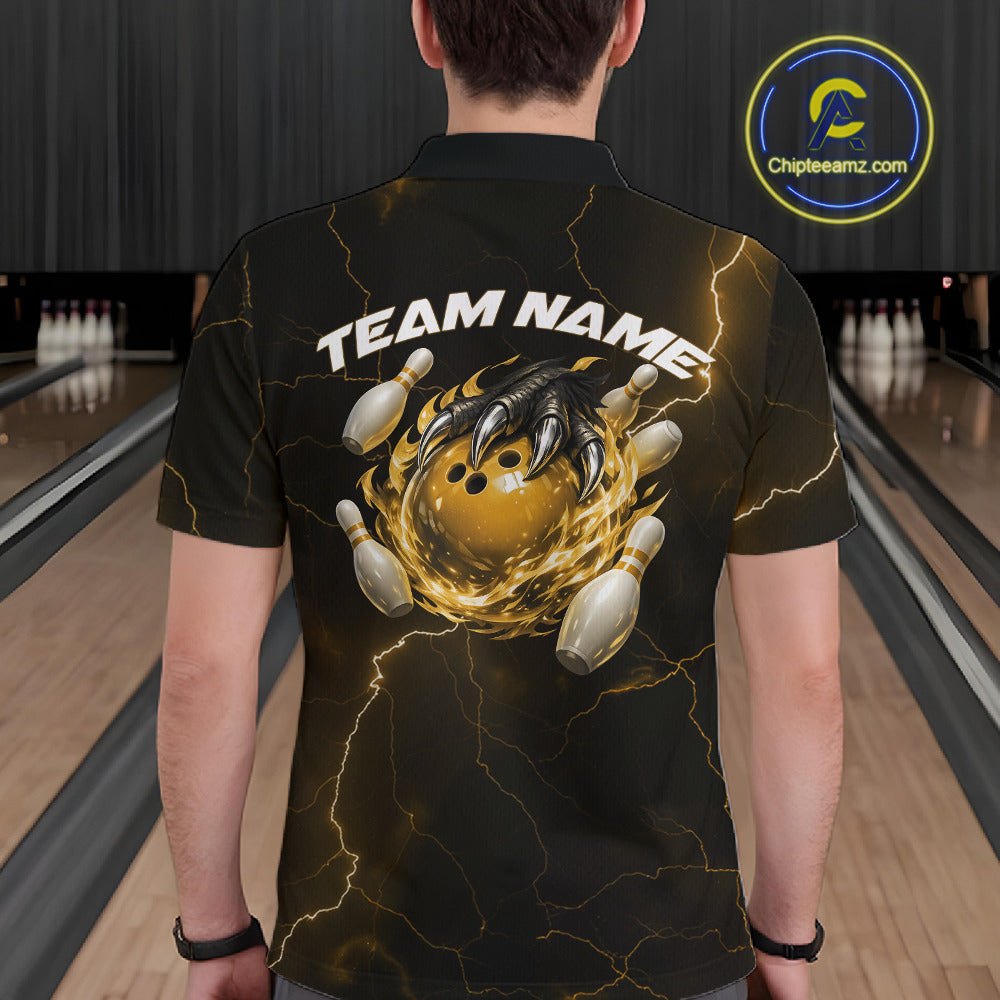 Back view of a black and yellow mens bowling polo showcasing a dragon claw holding a flaming bowling ball with bowling pins.