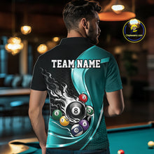 Load image into Gallery viewer, Back view of a male model wearing a black and blue billiard polo with metallic ribbons, dark honeycomb artwork, and a flaming 8-ball