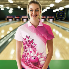 Load image into Gallery viewer, Front view of a female model in a white and pink bowling polo featuring butterfly graphics and colorful bowling artwork