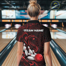 Load image into Gallery viewer, Back view of a female model wearing a black and red bowling polo shirt in a bowling alley featuring a tribal flame bowling ball and pins graphic