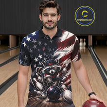 Load image into Gallery viewer, Front view of a male model at a bowling lane wearing a bowling polo shirt with a raccoon in patriotic sunglasses rolling a bowling ball through scattered pins against a distressed American flag backdrop.