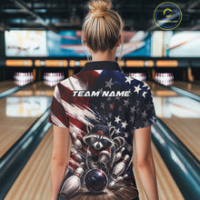 Load image into Gallery viewer, Back view of a female model at a bowling lane wearing a bowling polo shirt featuring a raccoon in patriotic sunglasses rolling a bowling ball through scattered pins with a distressed American flag backdrop.