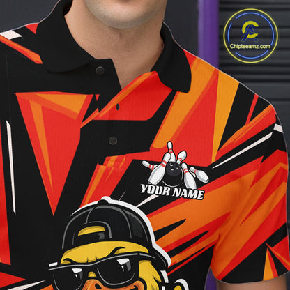 Left chest detail of a black and orange bowling polo highlighting a duck-themed bowling graphic.