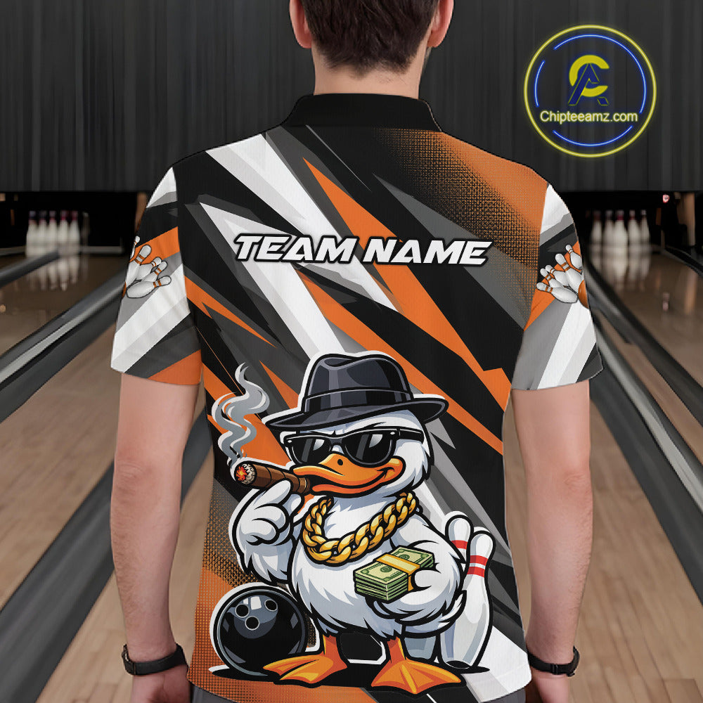Back view of a black and orange bowling polo shirt with bold duck-themed bowling graphics.