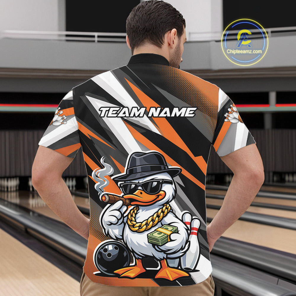 Front view male model wearing quarter-zip shirt featuring patriotic duck sunglasses beside bowling ball illustration