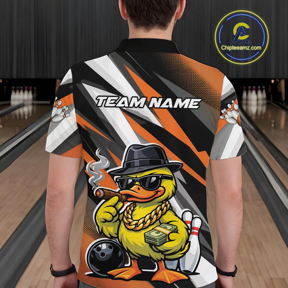 Back view of a black and orange bowling polo displaying a duck wearing sunglasses and fedora beside a bowling ball.