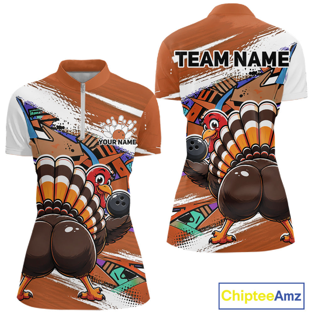 Front and back views of an orange custom women's quarter zip bowling shirt featuring a funny graffiti turkey holding a bowling ball, paint splatter accents, and a personalized name.