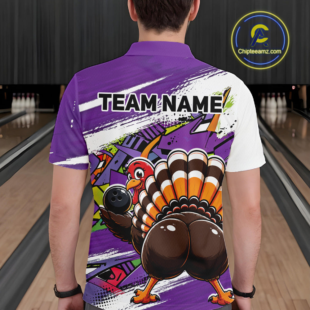 Back view of a male model wearing a purple custom bowling polo shirt featuring a funny graffiti style turkey holding a bowling ball, paint splatter details, and a custom name in a bowling alley.