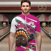 Load image into Gallery viewer, Front view of a male model wearing a pink custom quarter zip bowling shirt with a funny graffiti turkey holding a bowling ball, paint splatter accents in a bowling alley.