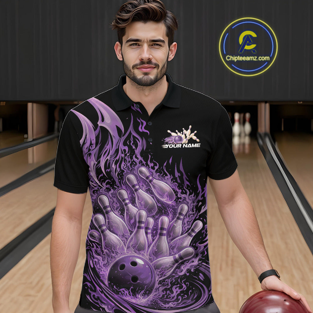 Male model wearing a black and purple bowling polo in a bowling alley with fiery bowling action artwork of a flaming ball striking pins.
