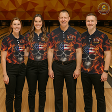 Load image into Gallery viewer, Four people wearing matching shirts with a skull and American flag design on a bowling alley.