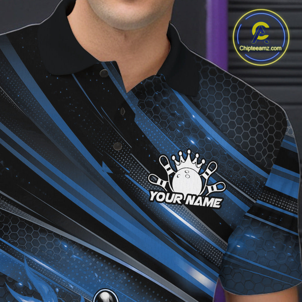 Close-up of the left chest area on a black and blue bowling polo shirt featuring a fiery bowling strike graphic with abstract stripes.