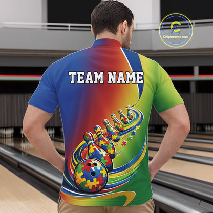 Male model in a bowling lane wearing a colorful quarter-zip shirt, autism puzzle-themed bowling strike design with multicolor graphic details.