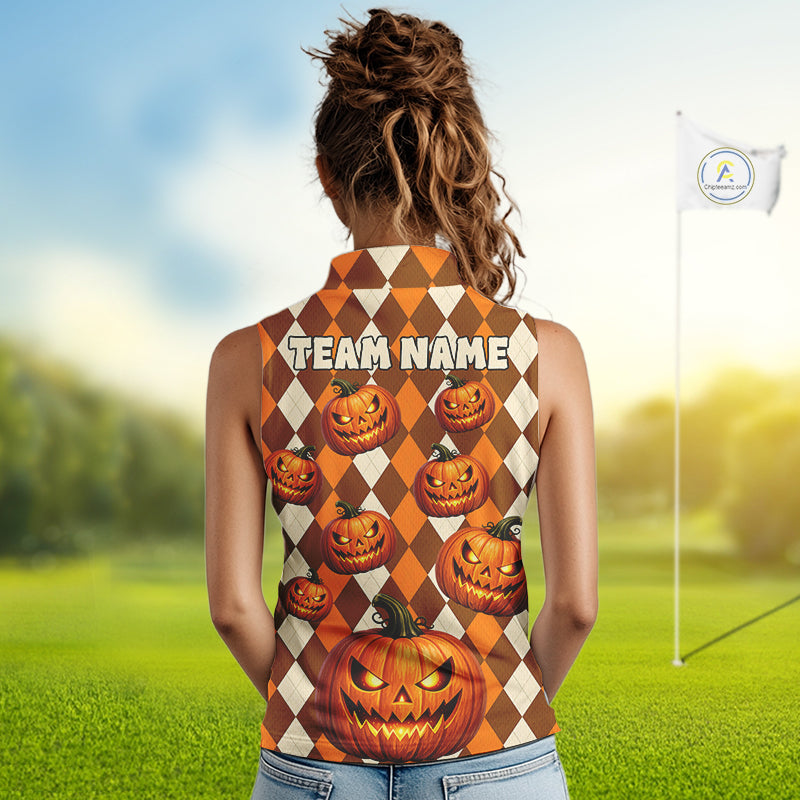 A woman viewed from behind wearing a sleeveless high-neck top with a Halloween-themed harlequin pattern of orange and white diamonds, featuring carved jack-o'-lantern pumpkins and the text 'TEAM NAME' across the upper back. The background is a blurred green grass field with a flagpole under a blue sky.