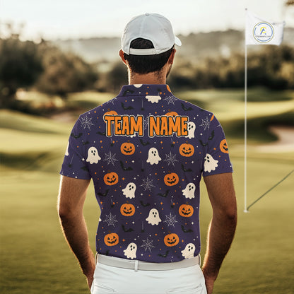 A man viewed from behind wearing a purple Halloween-themed golf shirt with a 'TEAM NAME' customization printed in orange on the back, set against a blurred golf course background.