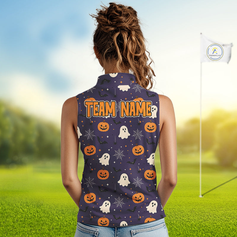 A woman viewed from behind wearing a sleeveless dark navy top with a Halloween print of pumpkins, ghosts, and spiders, plus the text 'TEAM NAME'. The background is a blurred green grass field with a flag.