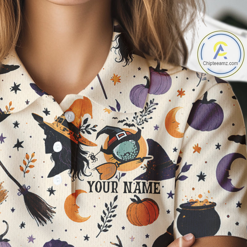 A close-up of a person wearing a short-sleeve collared shirt with a Halloween-themed print. The shirt has an off-white base with illustrations of witch hats, a witch silhouette, pumpkins, moons, stars, and broomsticks.