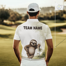 Load image into Gallery viewer, Person wearing a white shirt with a sloth graphic and 'TEAM NAME' text on a golf course.
