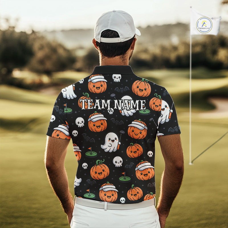 A man viewed from behind wearing a black short-sleeve polo shirt with a Halloween-themed print of pumpkins, ghosts, and skulls, standing on a golf course. The shirt features a customizable 'TEAM NAME' print on the back.