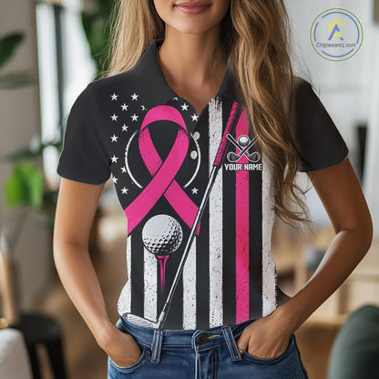 A woman wearing a black short-sleeve polo shirt with a distressed American flag design, featuring a pink ribbon, golf ball, golf club, and crossed golf clubs on the front. The shirt has 'YOUR NAME' printed on the chest, and a circular watermark logo for 'ChiPTEEAMZ"