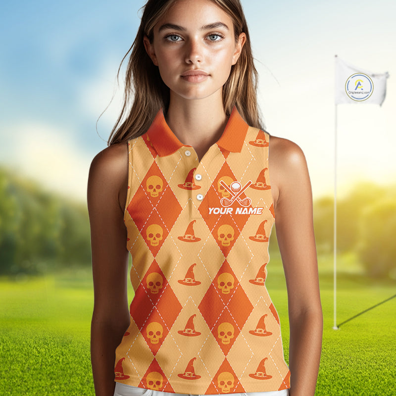 A woman modeling a sleeveless polo shirt with an orange and beige harlequin pattern featuring skulls and witch hats, set against a blurred golf course background.
