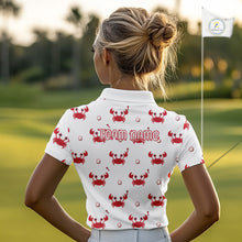 Load image into Gallery viewer, Person wearing a white polo shirt with red crab patterns and 'Team Name' text on a golf course.
