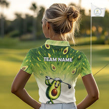 Load image into Gallery viewer, Person wearing a golf shirt with avocado design and 'TEAM NAME' text on a golf course.