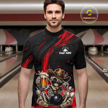 Load image into Gallery viewer, Man wearing a black and red bowling shirt with a skeleton design in a bowling alley.
