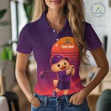 Load image into Gallery viewer, Person wearing a purple polo shirt with a cartoon duck design and customizable text.