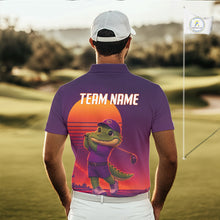 Load image into Gallery viewer, Person wearing a purple polo shirt with a cartoon alligator design on a golf course