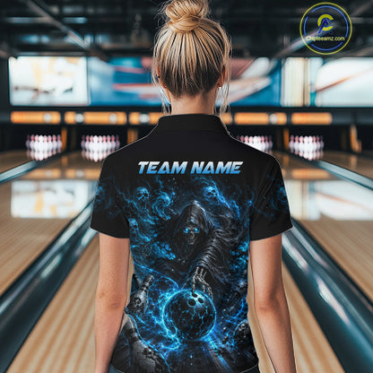 Person wearing a black t-shirt with a graphic design and 'TEAM NAME' text in a bowling alley.