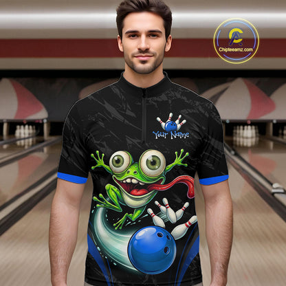 A man wearing a black short-sleeve cycling jersey with a colorful graphic of a green cartoon frog, bowling pins, and a blue bowling ball. The jersey has blue trim on the collar and cuffs, and the background shows a blurred bowling alley scene.