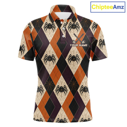 A short-sleeve polo shirt with a Halloween-themed argyle pattern featuring spiders, webs, and orange, black, and beige diamonds. The shirt has a white collar, a three-button placket, and 'YOUR NAME' printed on the chest alongside crossed golf clubs.