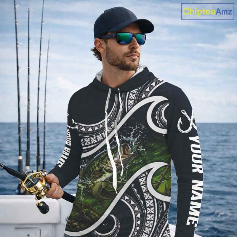 Angler wearing blue tribal pattern custom largemouth bass long sleeve hooded fishing shirt on the water