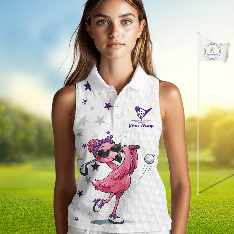 Woman wearing a white sleeveless golf shirt with a pink flamingo design on a golf course.