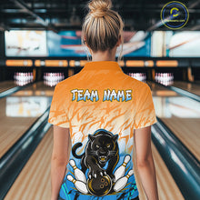 Load image into Gallery viewer, Bowler wearing custom orange and blue leopard bowling shirt on the lanes