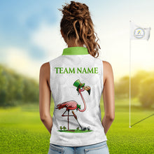 Load image into Gallery viewer, Golfer wearing Funny Flamingo green clover white womens sleeveless golf polo shirt St Patrick Day on golf course