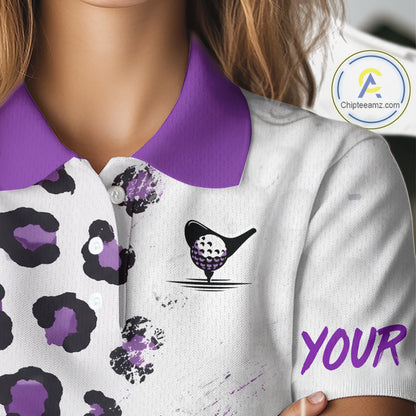 White polo shirt with purple leopard pattern and a golf ball design