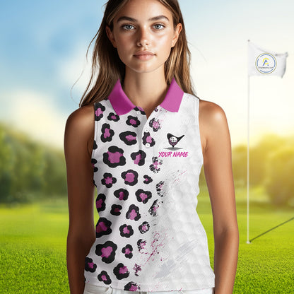Woman wearing a white sleeveless golf top with pink leopard print and 'Your Name' text on a golf course background.