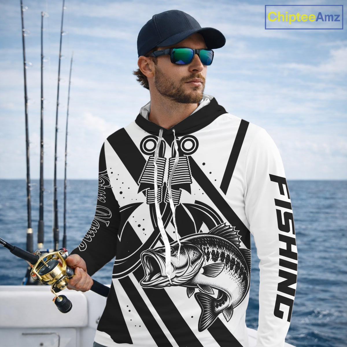 Angler wearing black and white largemouth bass long sleeve hooded fishing shirt on boat